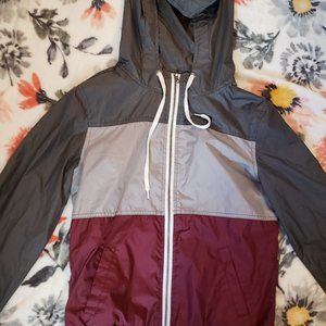 burgundy, and grey wind breaker